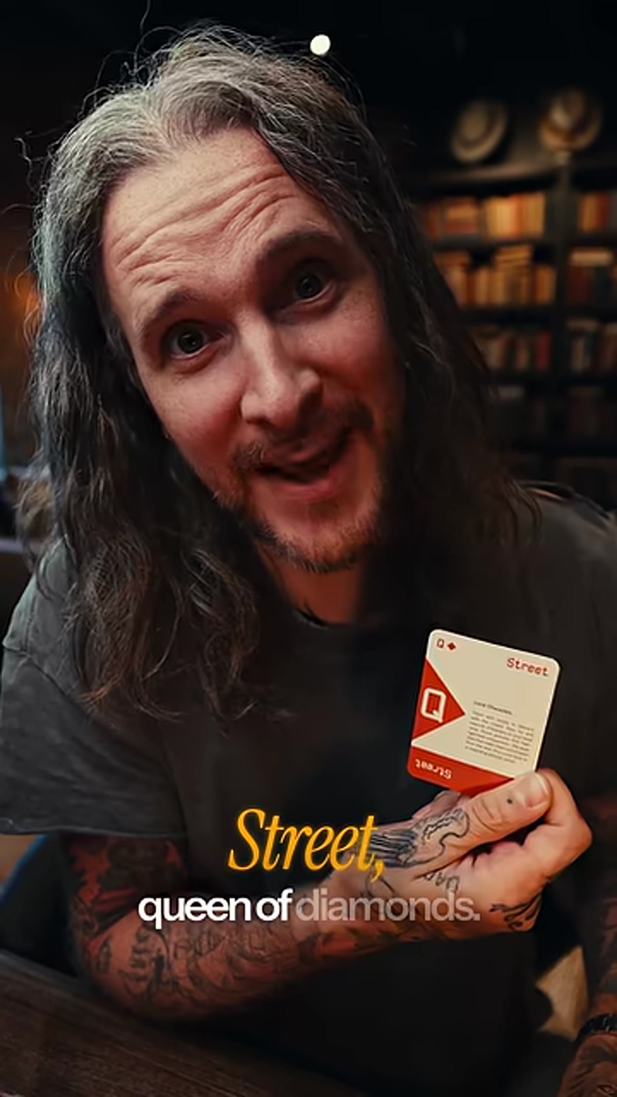 McKinnon reading the Queen of Diamonds street photography tip