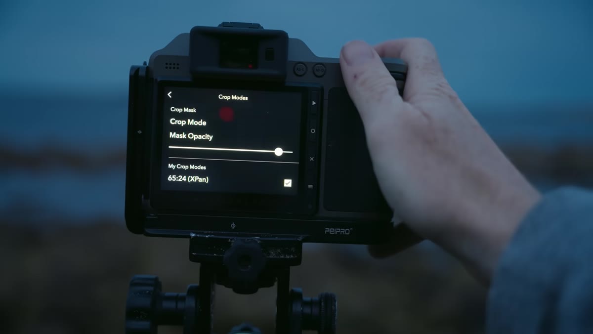 Camera screen showing panoramic aspect ratio framing selected