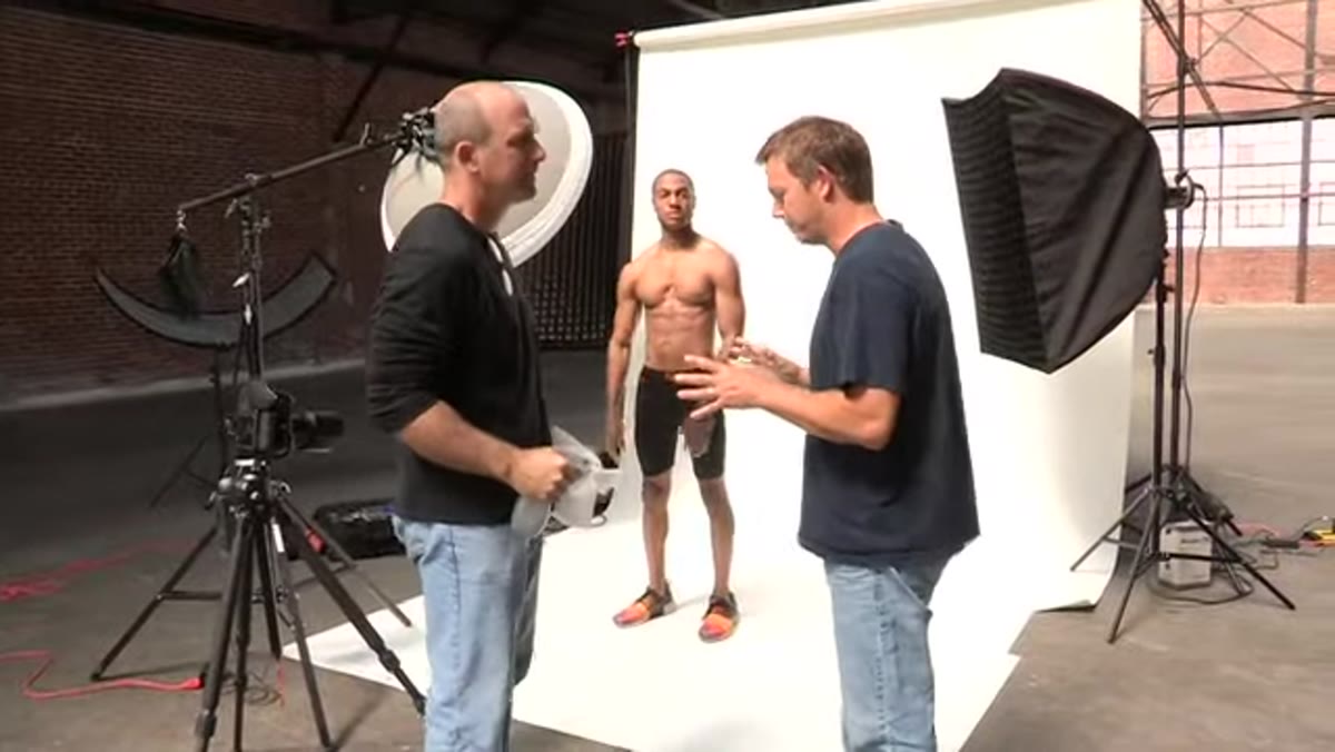 Glycerin being applied to subject&rsquo;s torso before shooting