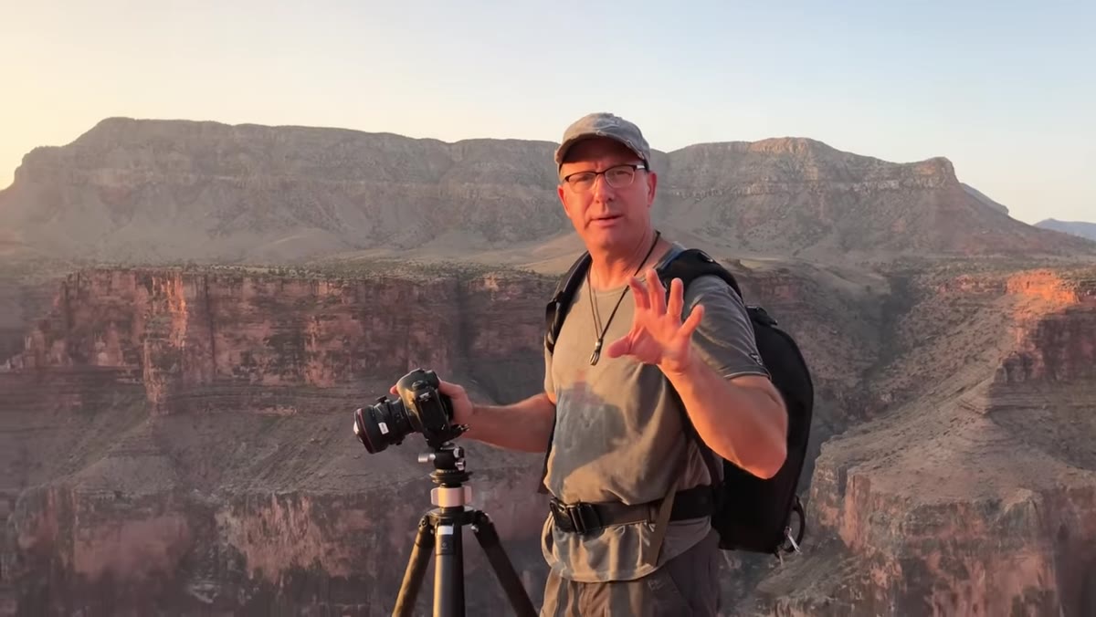 Joel shifting lens down and using live view to focus on rocks