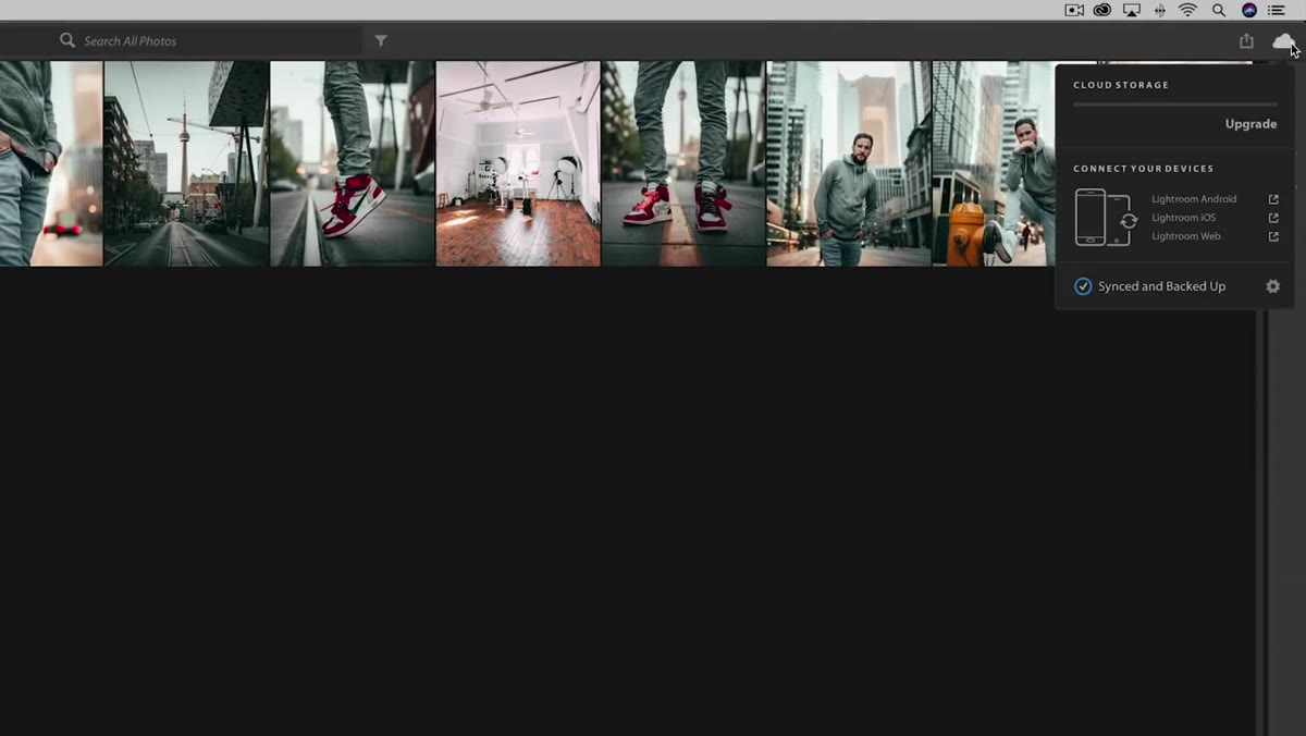 Cloud sync icon in Lightroom CC showing upload in progress