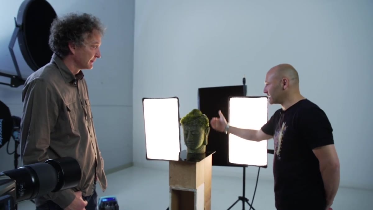 Two small soft boxes positioned behind and to each side of the Buddha head