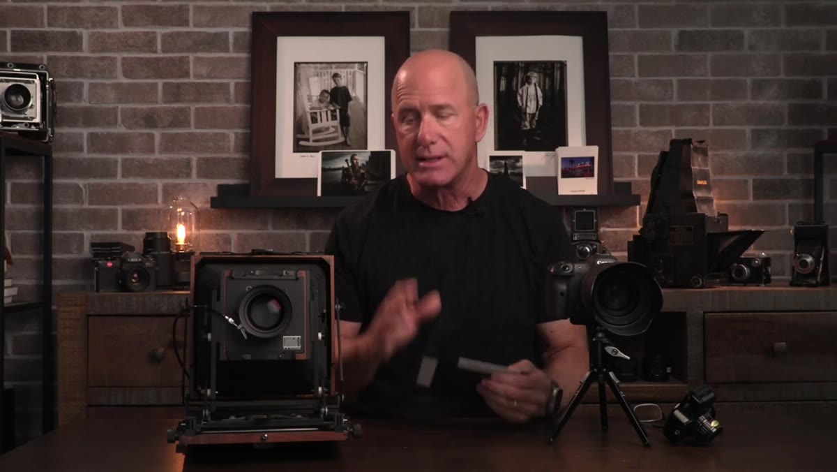 Multiple film holders staged and ready beside the camera