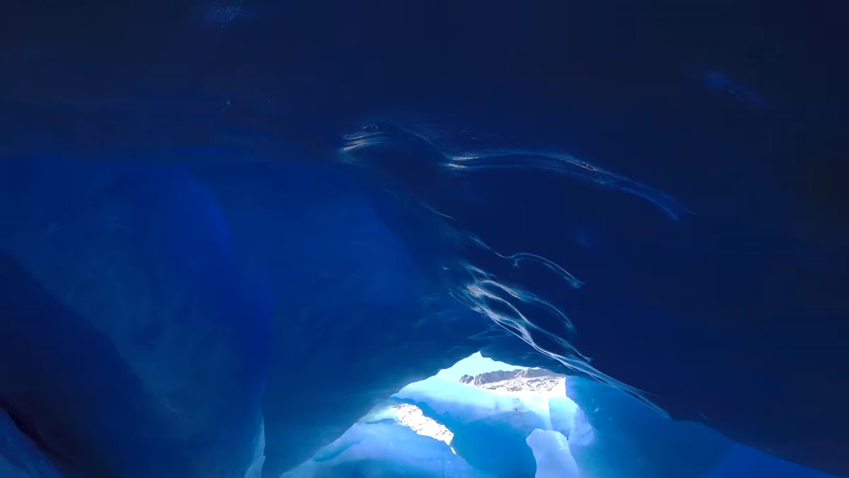 Deep blue tones in ice textures and cave walls