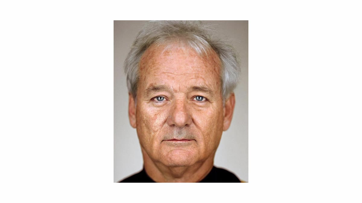 Portrait showing bright front lighting with darker shadow on sides of face