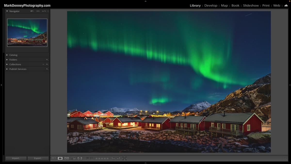 Landscape orientation photo from Norway with mountains and red cabins