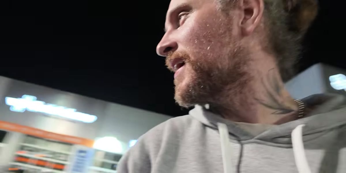 Group using flashlight to determine truck&rsquo;s actual paint color