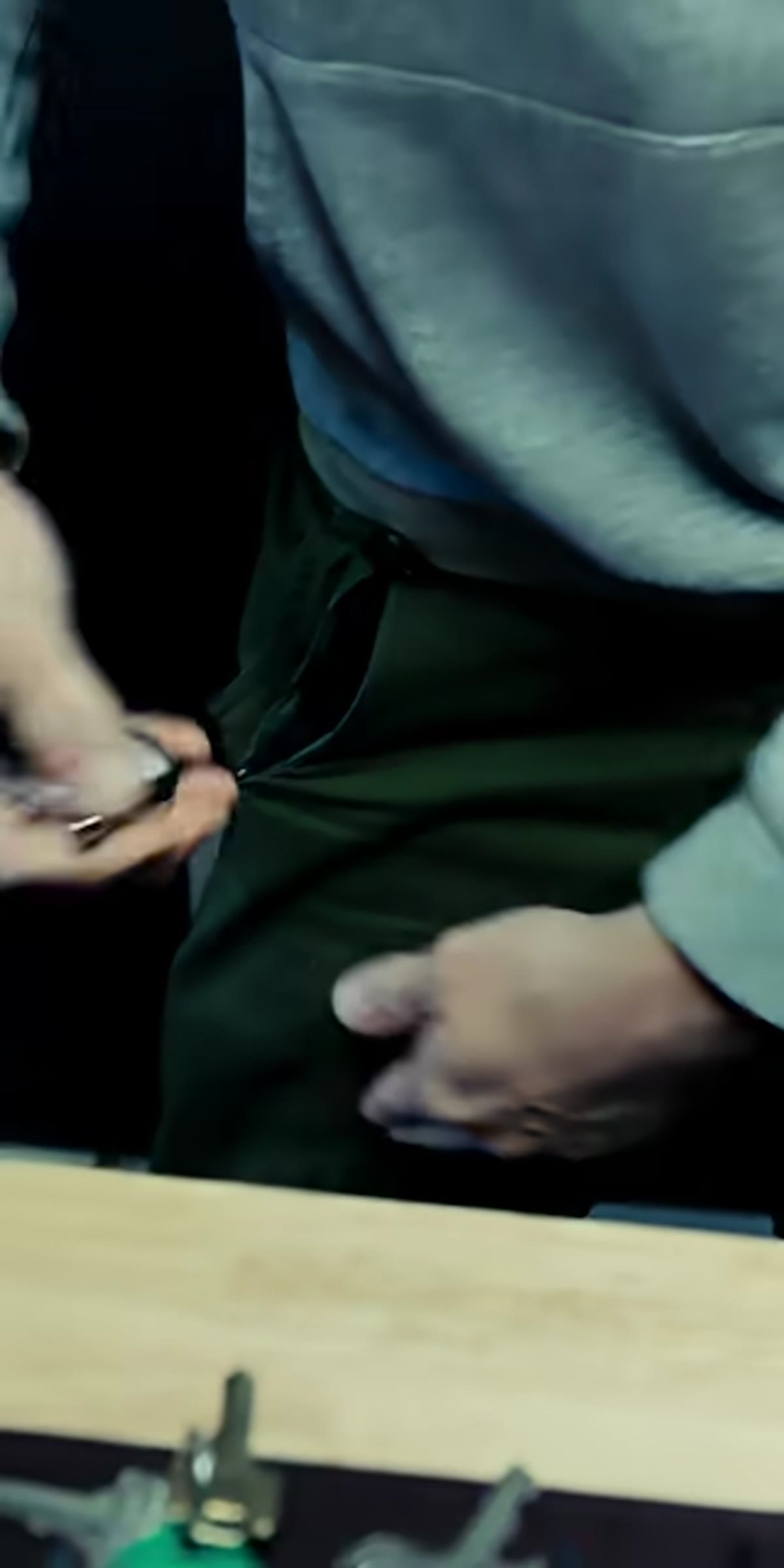Mechanical stopwatch being held and demonstrated