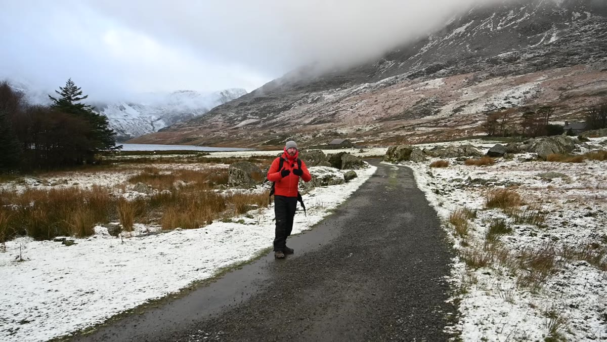 Nigel stopping mid-trail to photograph breaking cloud conditions