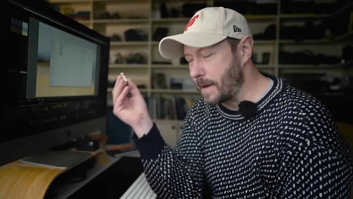 Card reader connected on studio desk with card being inserted carefully